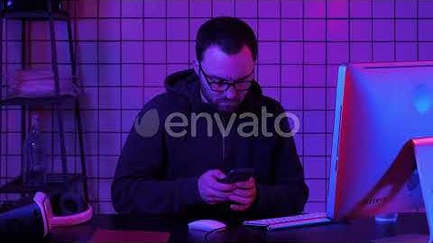 Hacker using mobile smartphone and stealing personal information | Stock Footage - Videohive