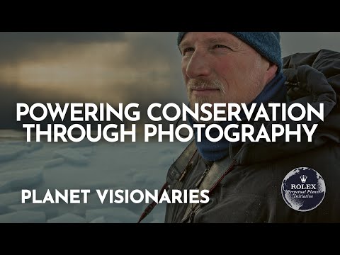 Photography, Coat, Jacket. Text: POWERING CONSERVATION THROUGH PHOTOGRAPHY ROLEX PLANET VISIONARIES