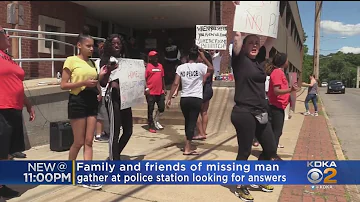 Family And Friends Of Missing Man Protest Outside Of Police Station