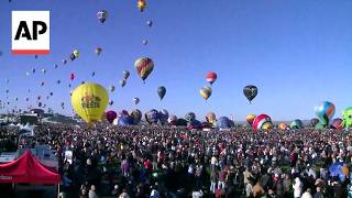 Crew escapes as a hot air balloon crashes into power lines in Albuquerque