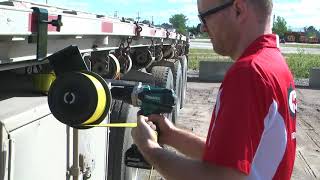 Roll And Store your flatbed straps easily with this tool