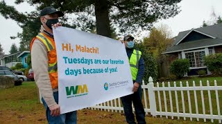 Garbage collectors in Lynnwood deliver special surprise to 3-year-old fan with spina bifida