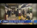 Woman pushed into side of subway train in brooklyn