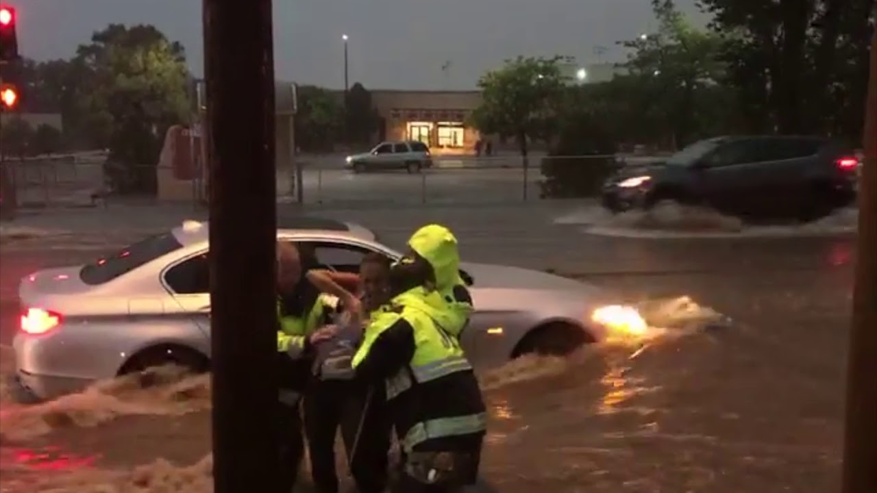 Car rescue, flooding in Santa Fe, NM. July 23, 2018.