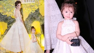 Con gái  Elly Trần điệu đà đeo túi hàng hiệu diện váy trắng trong tiệc sinh nhật 2 tuổi
