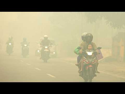 Indonesia's skies turn apocalyptic orange as smoke blankets Singapore