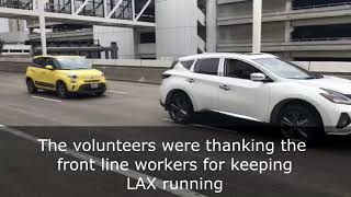 LAX volunteers thank front line workers with a mini-parade