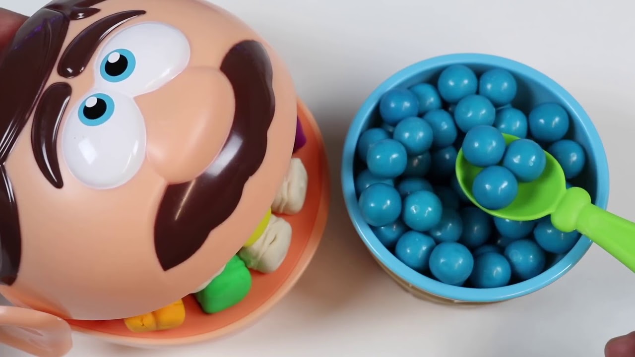 Feeding Mr Play Doh Head Rainbow Gumballs from Dubble Bubble Candy