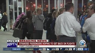Passengers stranded after shooting at Fort Lauderdale-Hollywood International Airport still trying t