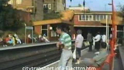 Class 313 train switching between overhead wire & 3rd rail