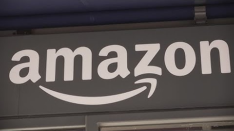 Amazon to cut about 14,000 corporate jobs in AI push | REUTERS