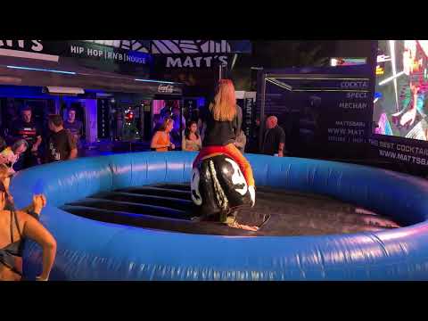 Girl Riding on a Bull in Benidorm 2024 😍 Mechanical Bull Riding 4K Spain