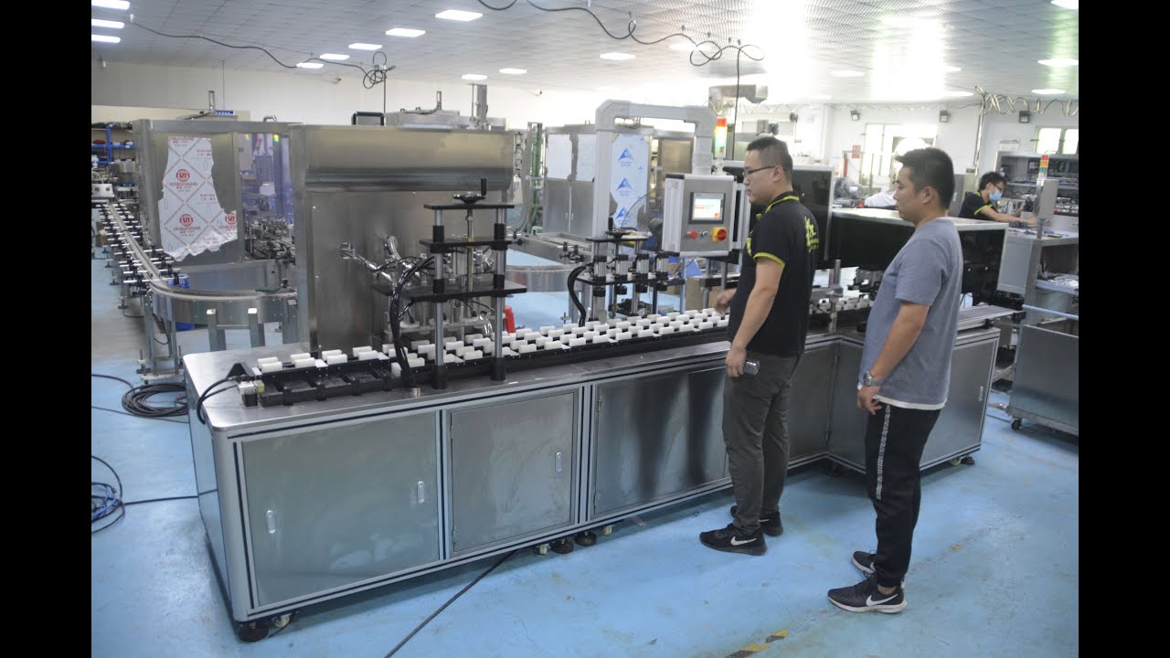 Capping Robot Latest 4 heads universal used filling & capping & robot hand picking up ...