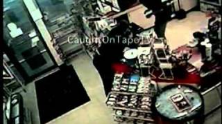 ROBBER THROWS COFFEE AT CLERK!