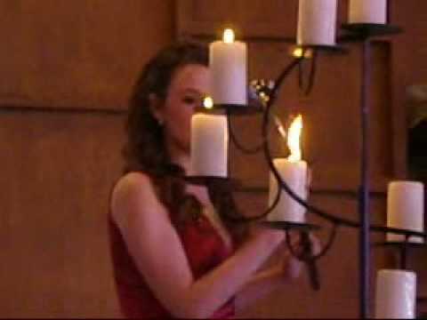 Joanna Lights Candles