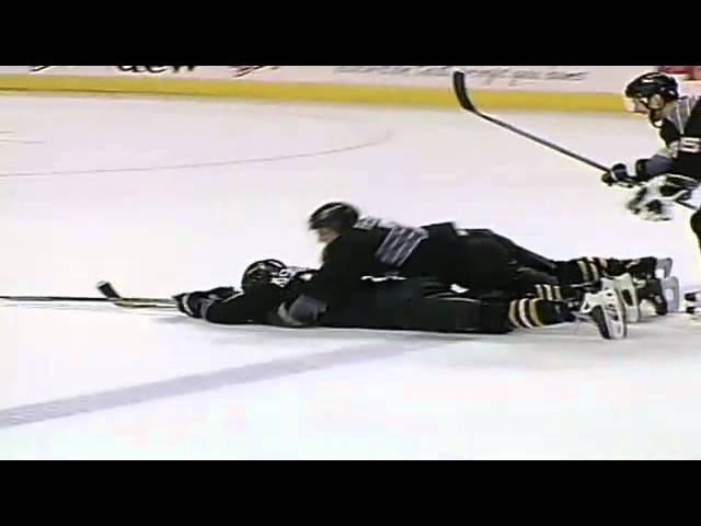 Wacky Goal Celebration: Theo Fleury goes for a slide 