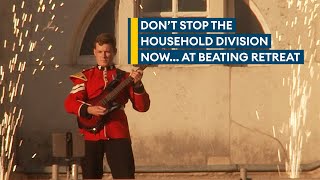 Guardsman's electrifying Queen rendition from top of Horse Guards