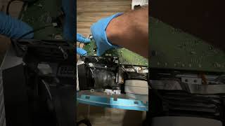 Reassembly of a Benq TK800M projector after cleaning the color wheel sensor and repasting the DMD.