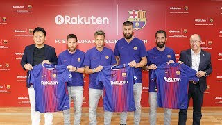 Rakuten president hiroshi mikitani, lionel messi, neymar, gerard pique
and arda turan, speak during a press event at crimson house
headquarters in se...