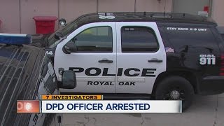 DPD Officer arrested