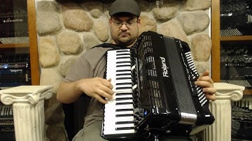 2176 - Black Roland FR 7X Digital Reedless Accordion 120 $2995