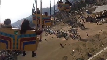 Terrifying footage as giant swing falls to ground injuring 16 at Chinese amusement park