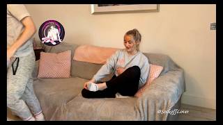 Girl removes sock to get a foot tatoo