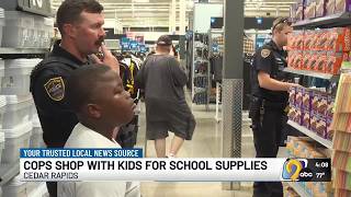 Cedar Rapids Police officers help kids get back-to-school supplies