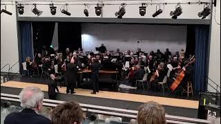 Alexander Roe MBE preparing the piano at a recent concert with the Preston Symphony Orchestra 