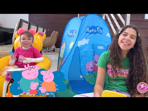 Sarah and Eloah in a funny story from Peppa Pig's cabin.