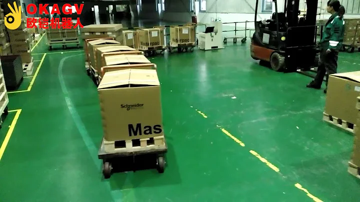404 Tugger AGV tows the trolleys like a train in a famous electric factory 2