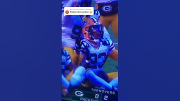 Justin Fields throws an interception to the Green Bay Packers