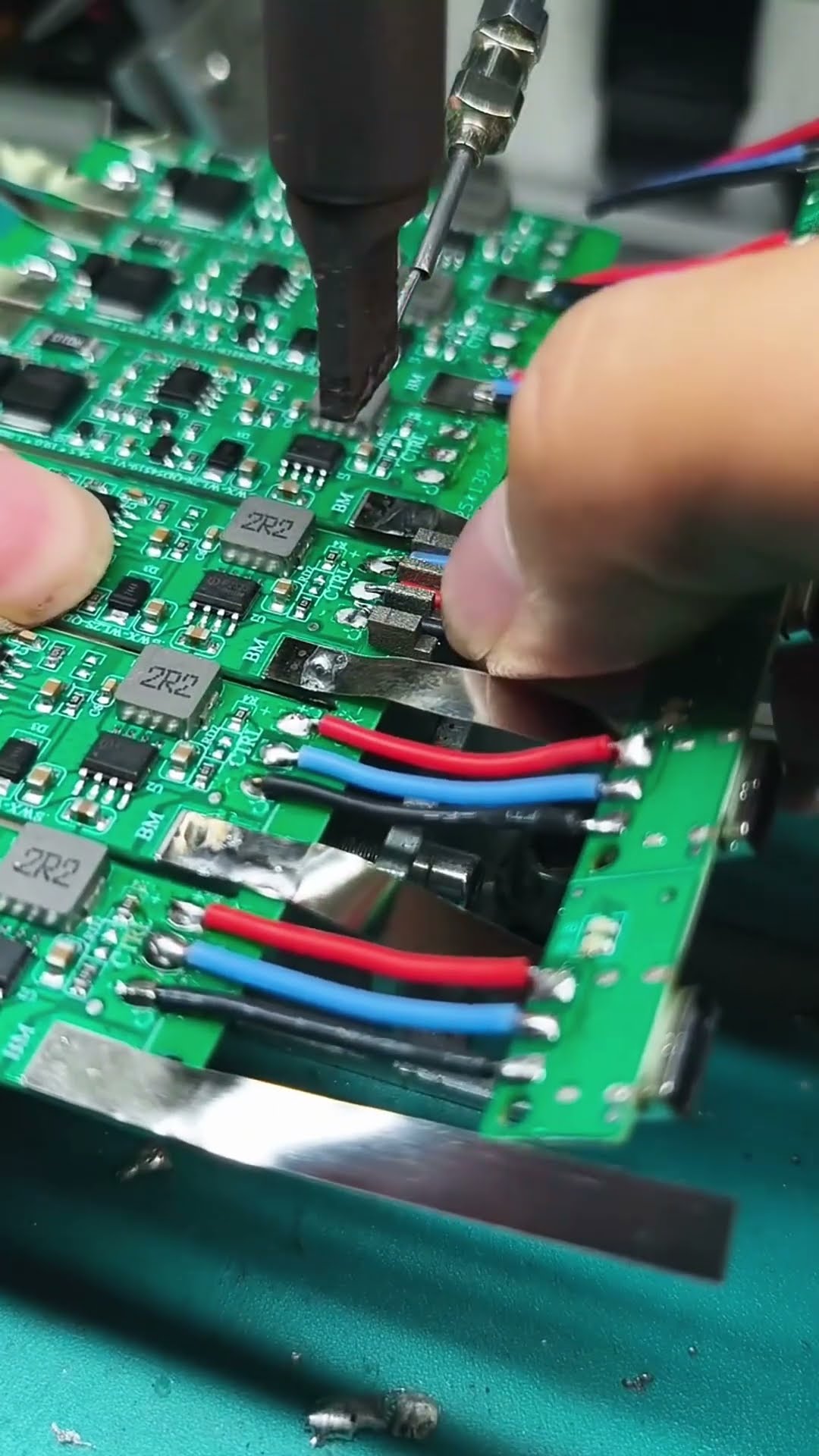 Process of welding wires on a circuit board- Good tools and machinery make work easy