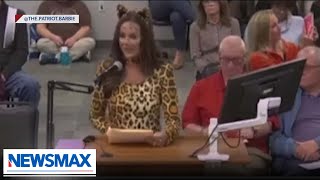 WATCH: Mom protests wokeness in cat costume at school board meeting