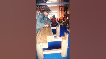 the process of assembling a wooden table with great precision #shorts