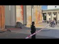 Climate activists spray-paint Brandenburg Gate to demand political action | AFP