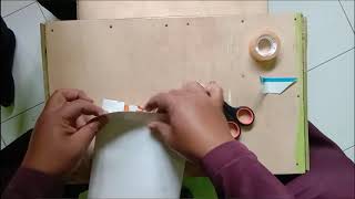 Menyampul Buku dengan Kalender Bekas