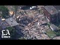 Gas explosion levels 3 Baltimore homes; 1 dead, others trapped