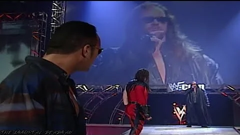 The Undertaker, Kane and The Rock confronts Triple H, Vince Mcmahon and Shane Mcmahon