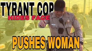 Bad Cop Pushes Woman Back 2 Feet For Filming