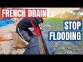 How to stop flooding with a french drain  diy