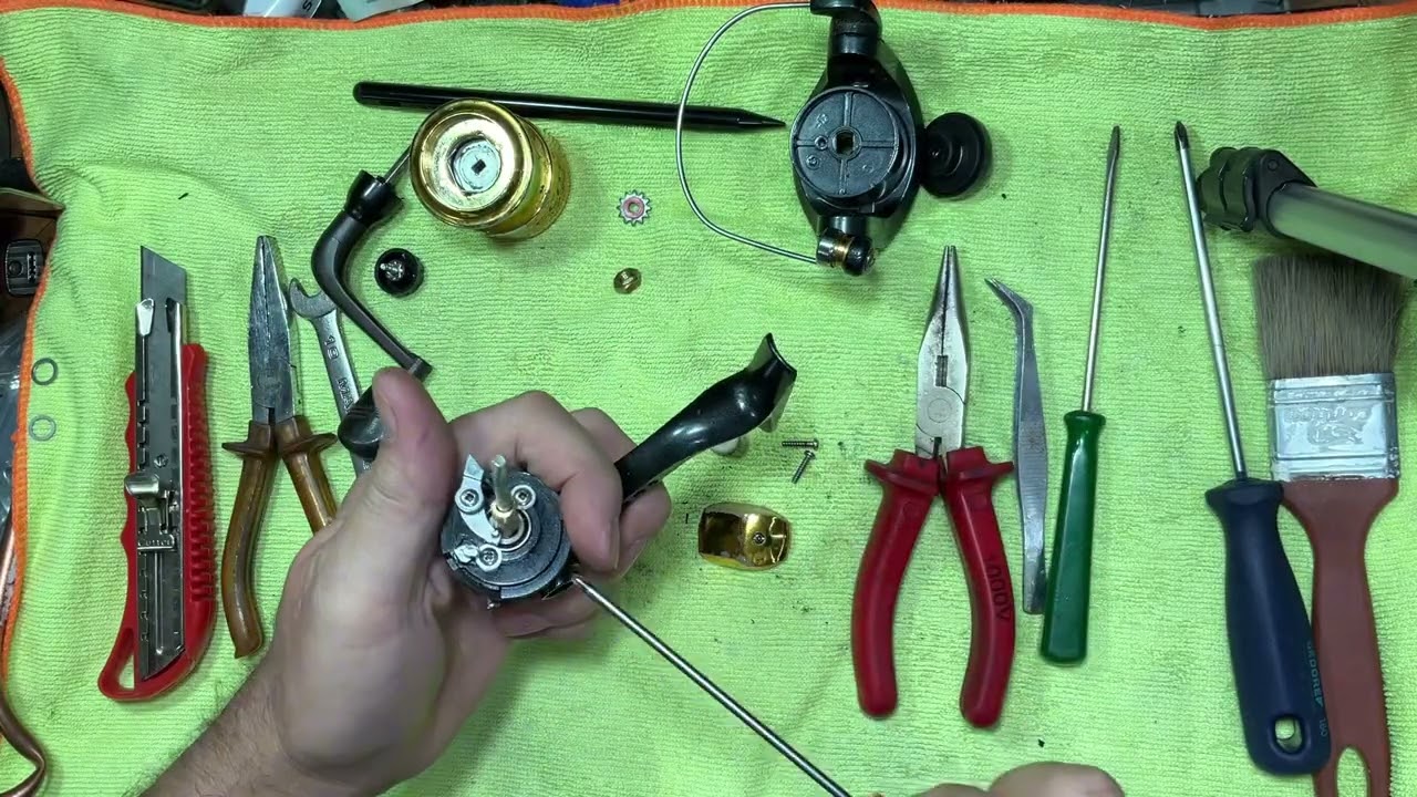 Como desmontar e lubrificar o molinete elite 1000 