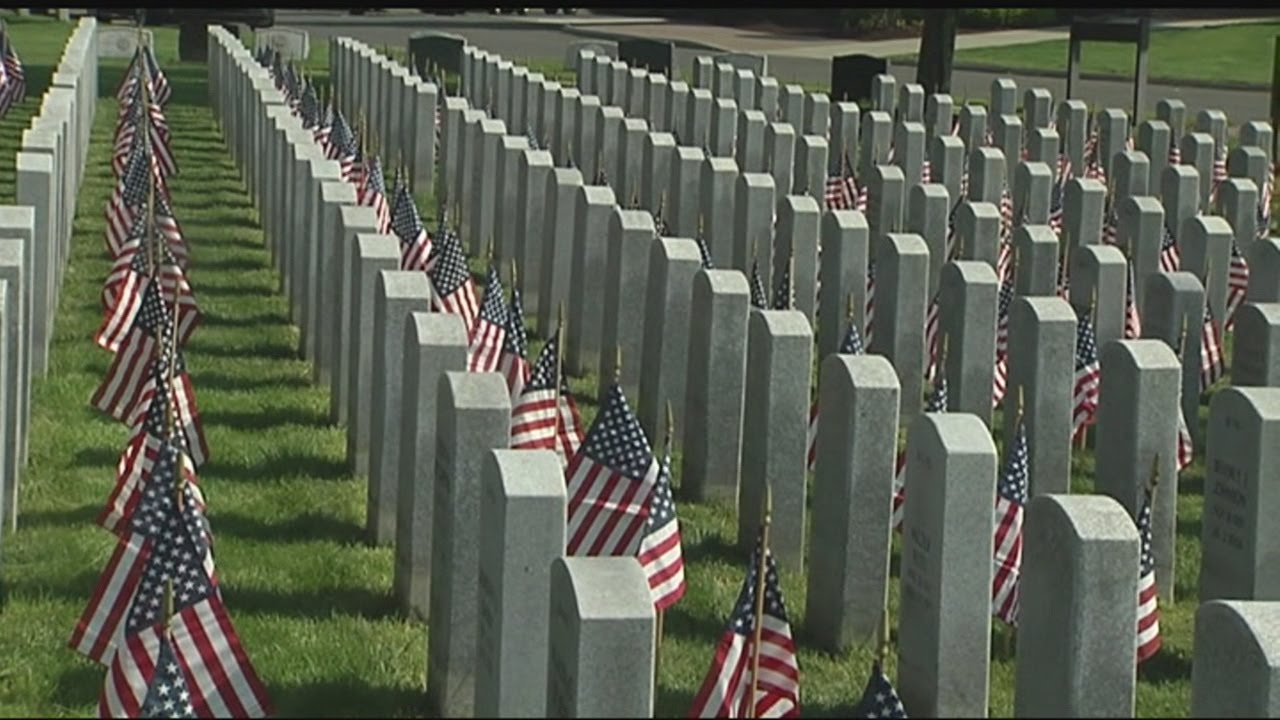 American Flags placed at graves at Veterans Memorial Cemetery in Agawam ...