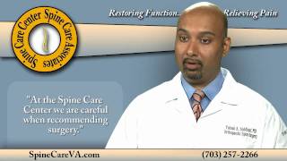 When does the Spine Care Center recommend surgery