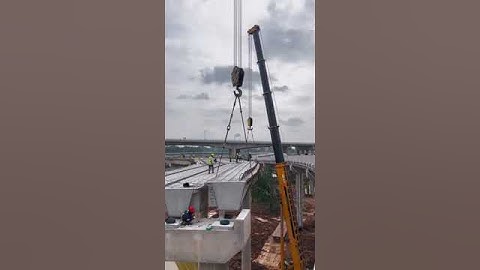 Hoisting process of elevated curved bridge  Good tools and machinery make work easy
