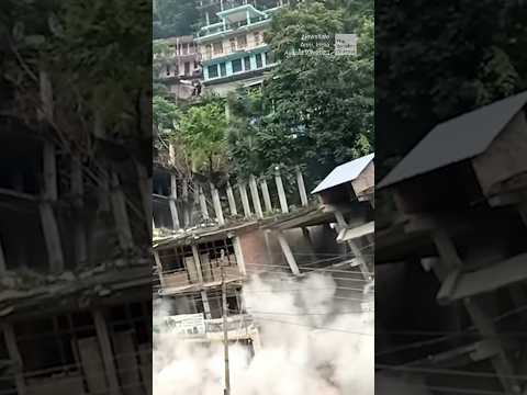Landslide tears through buildings in India