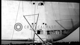 USS Akron (ZRS-4) leaves the mooring mast and takes off from Lakehurst, New Jerse...HD Stock Footage