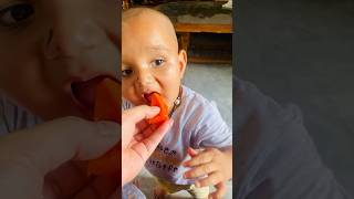 Prithvi Tasting Papaya