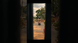 Taking Photos Through The Gap Between Two Utility Poles And Waiting For a Subject To Pass By