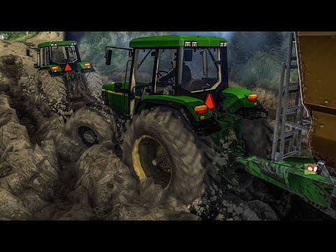 Видео: Буксировка John Deere 6910 из грязи с помощью лебедки